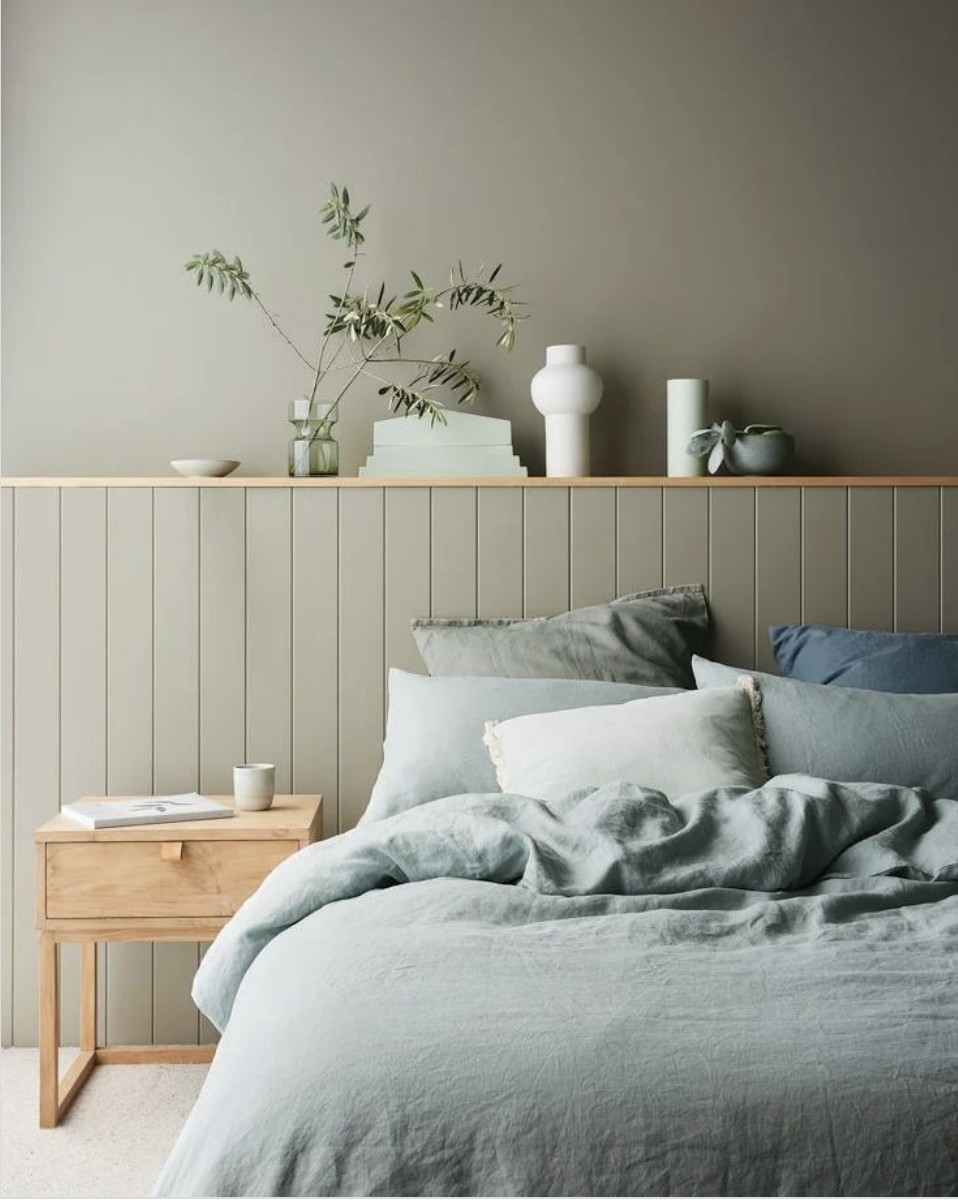 Grey Wainscoting Wall With Wooden Shelf