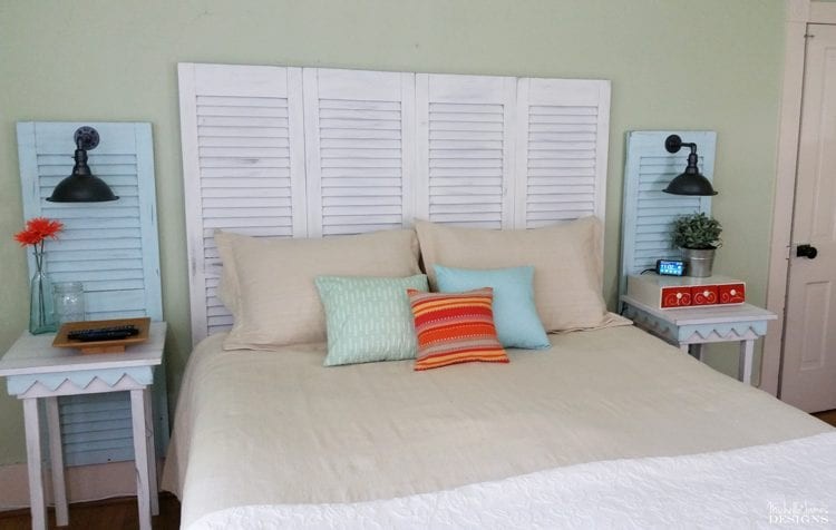 Use old shutters as a headboard