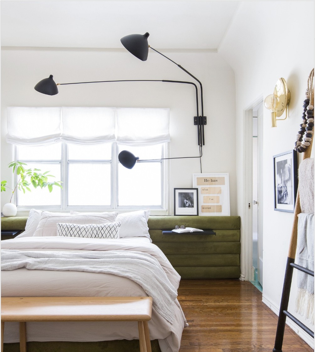 No Headboard Bedroom With Large Window And Sheer Curtain