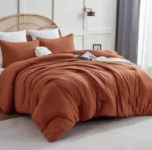 Use Warm Colored, Patterned, Printed Or Textile Bedding