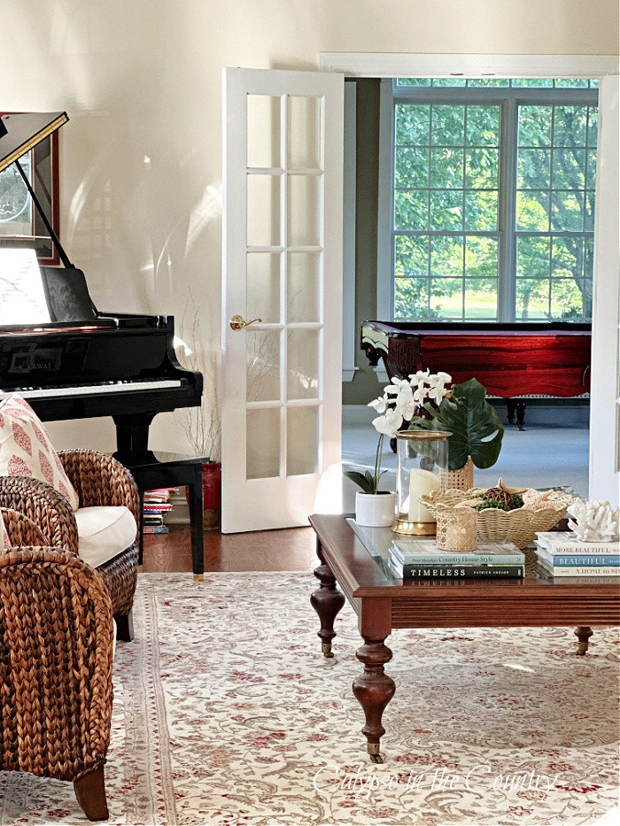 Living room with a British Colonial aesthetic…