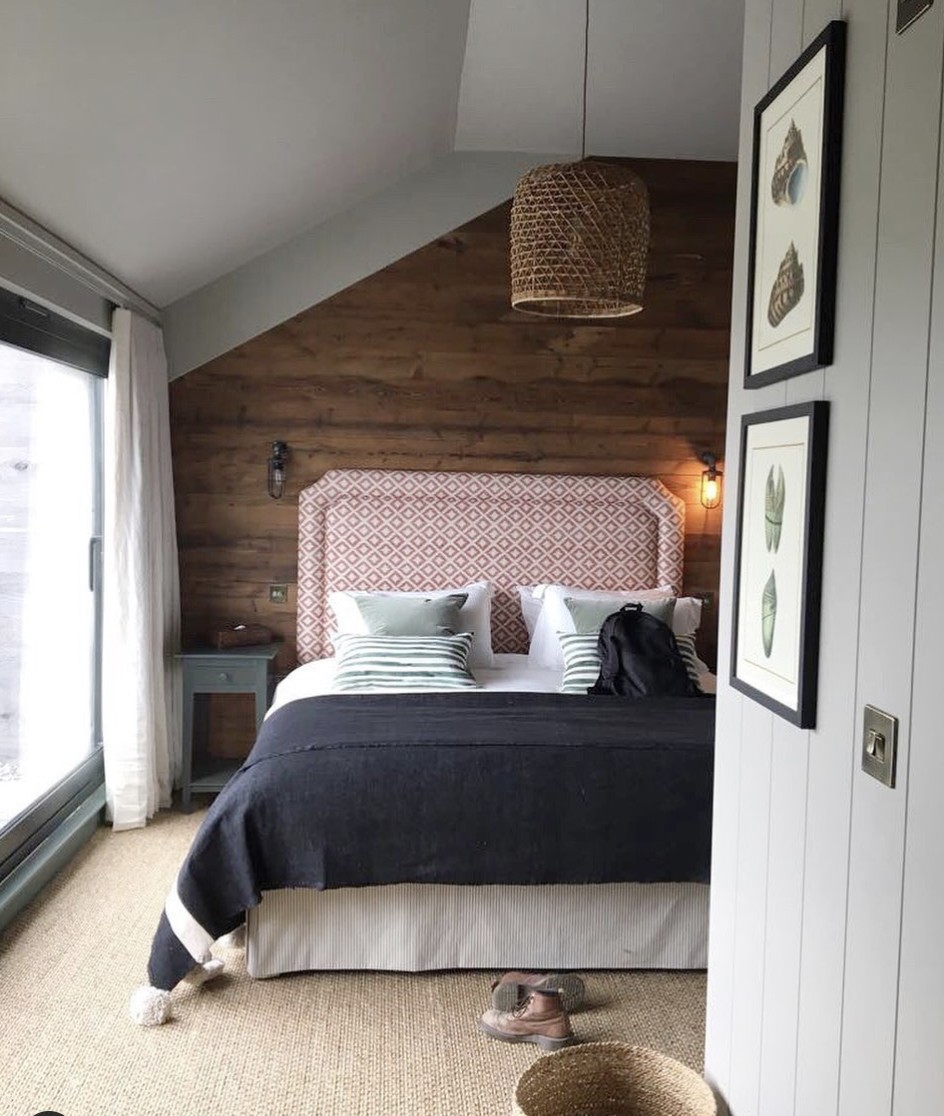 Wooden Accent Wall And Beige Carpet For Coziness