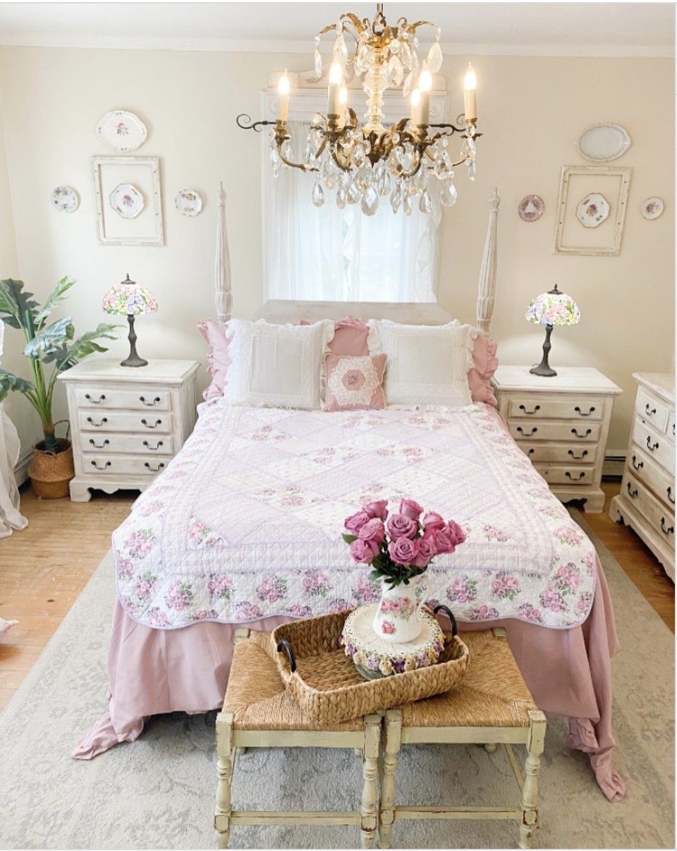 White And Pink Bed With Bedside Tables On Both Sides