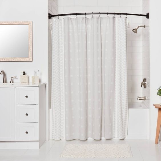 Upgrade the shower curtain + the curtain rod