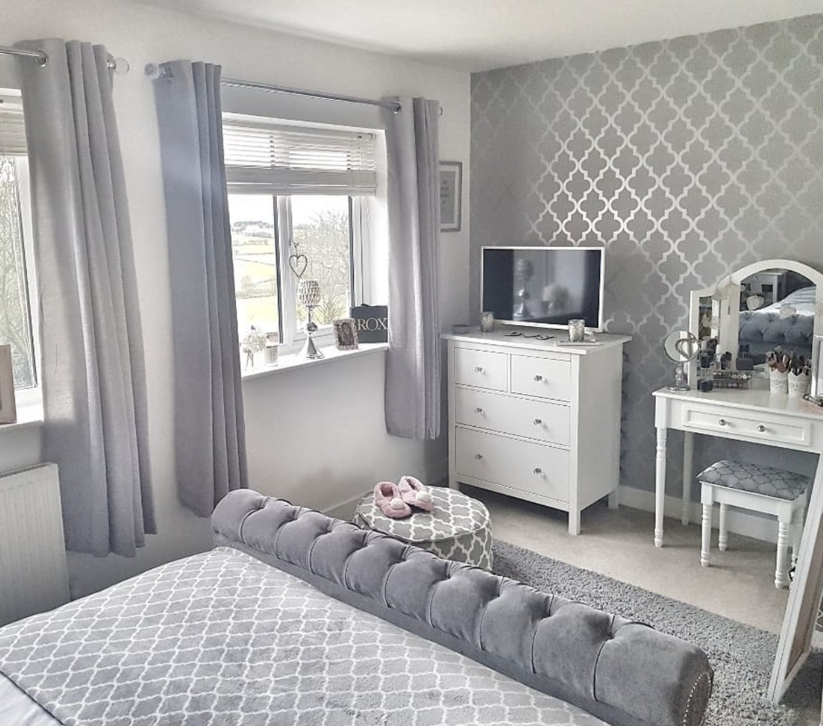 Grey Accent Wall Bedroom With White Dresser As Tv Stand