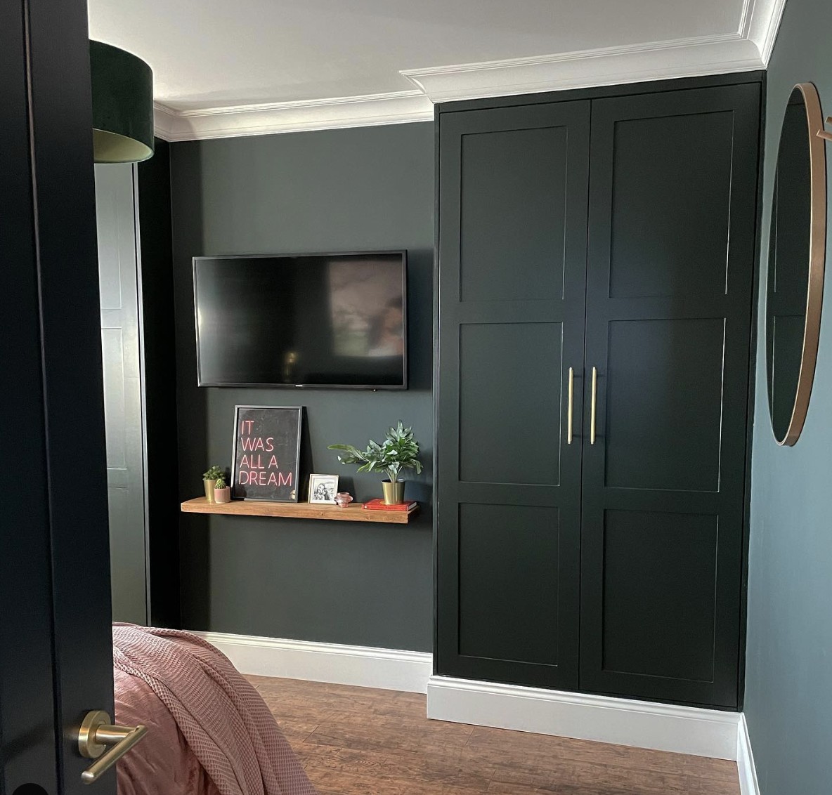 Dark Forest Green Bedroom With TV